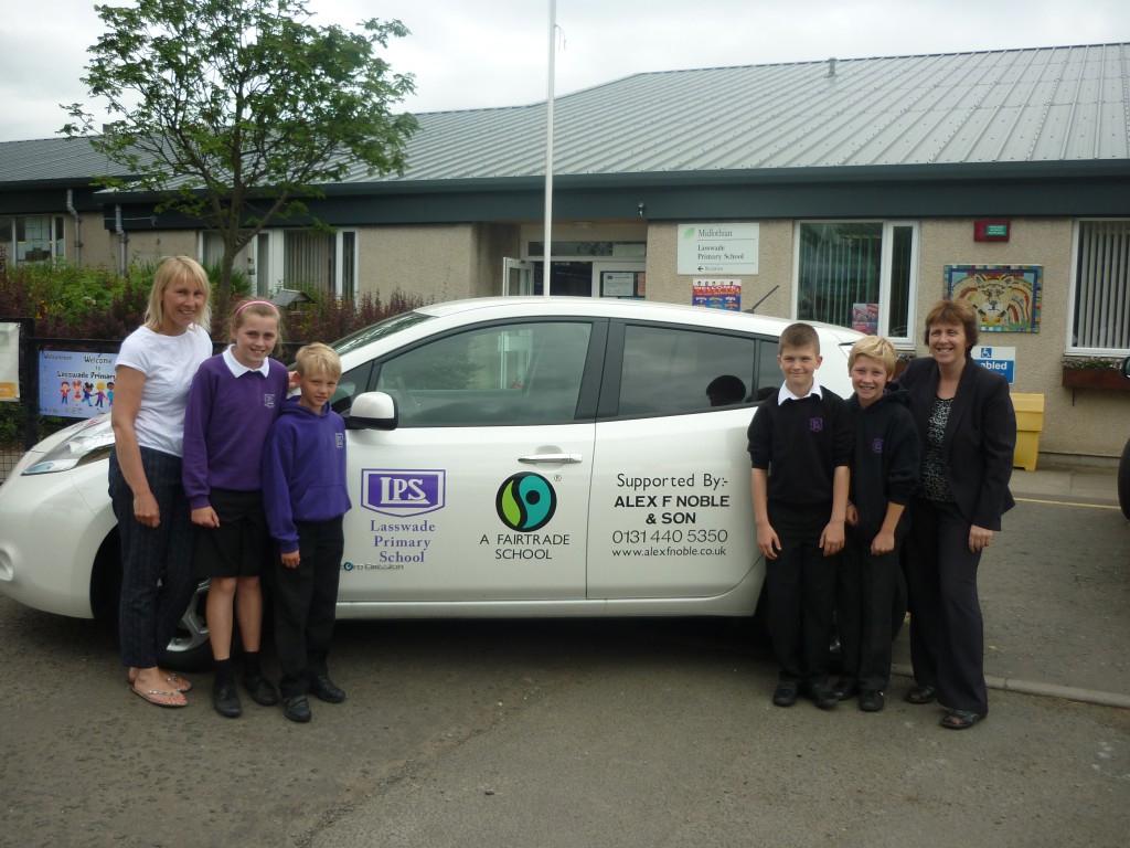 From left, Lasswade Primary School deputy head Jill Doyle, pupils Hannah, Declan, Darius and Fraser, and head teacher, Julie Fox in front of the Nissan LEAF