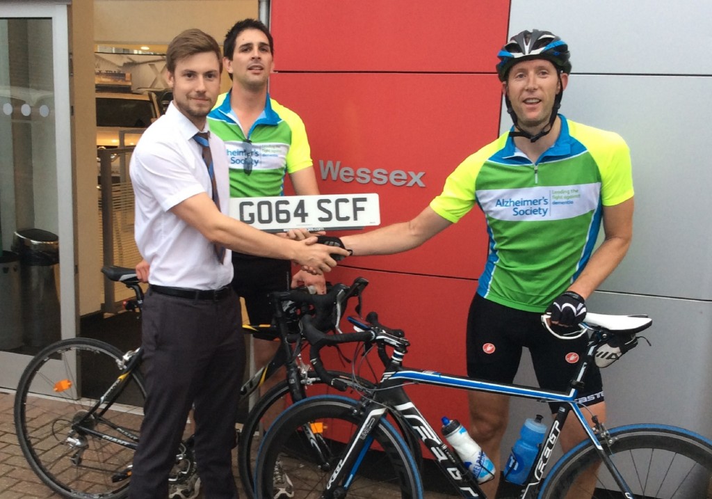 Roger Orgee, left, Nissan brand manager at Wessex Garages, with members of the Great '64 Plate Bike Ride team