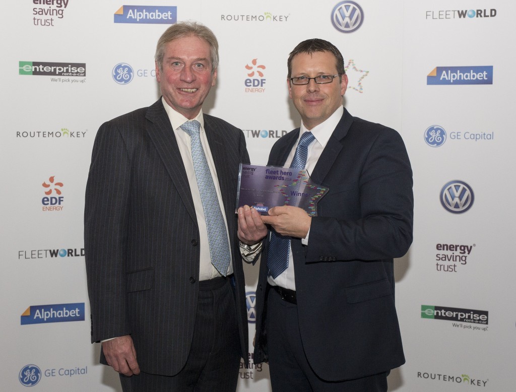 Barry Beeston, Corporate Sales Director at Nissan Motor (GB), (right), receives the company’s Fleet Hero award from Ted Brown, Chairman of the Energy Saving Trust.