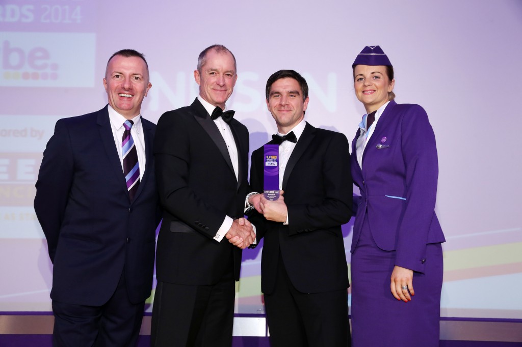 Michael Stewart, Corporate Sales Planning Manager at Nissan Motor (GB) (centre right) receives the company’s award from Philip Miley, Sales and Marketing Director of category sponsors Fleet Financial, as Flybe crew members Ken Boyd and Natalie McSorley look on.