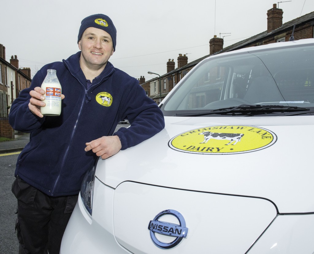 Andrew Brown with one of the dairy's new Nissan e-NV200s