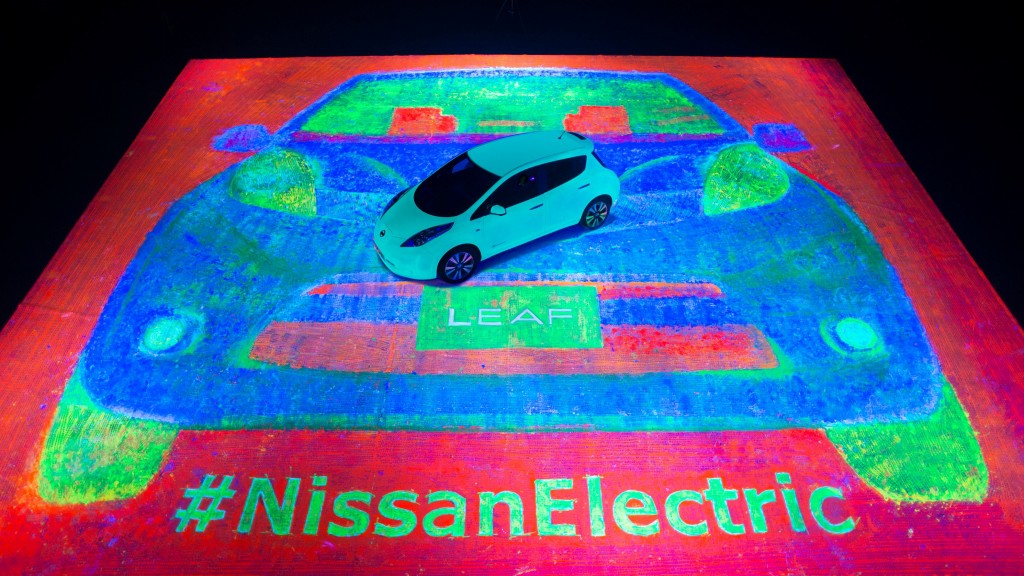 Nissan has broken the Guinness World Record title for the largest glow-in-the-dark painting by using the glow-in-the-dark Nissan LEAF to paint a 207.68m2 self-portrait of the 100-percent electric car.