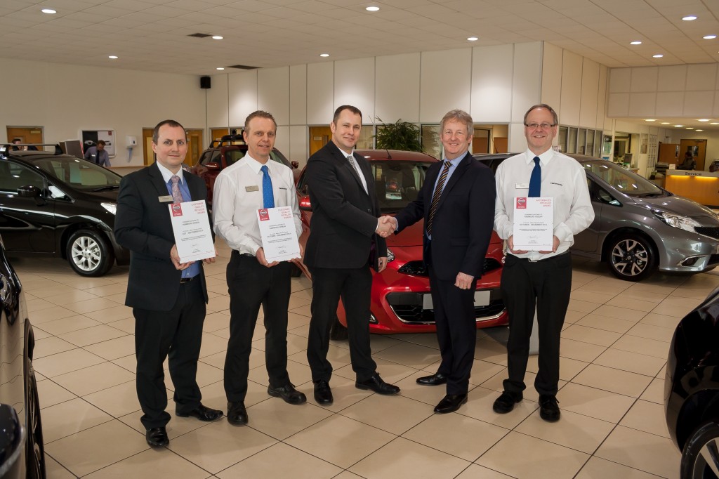 David Kindred, Sales Manager, Keith Boggis, Service Manager, Ashley Freeston, After Sales Performance Manager, Nissan Motor GB, Piers Capleton, Dealer Principal, and Mark Rose, Parts Manger, with their awards