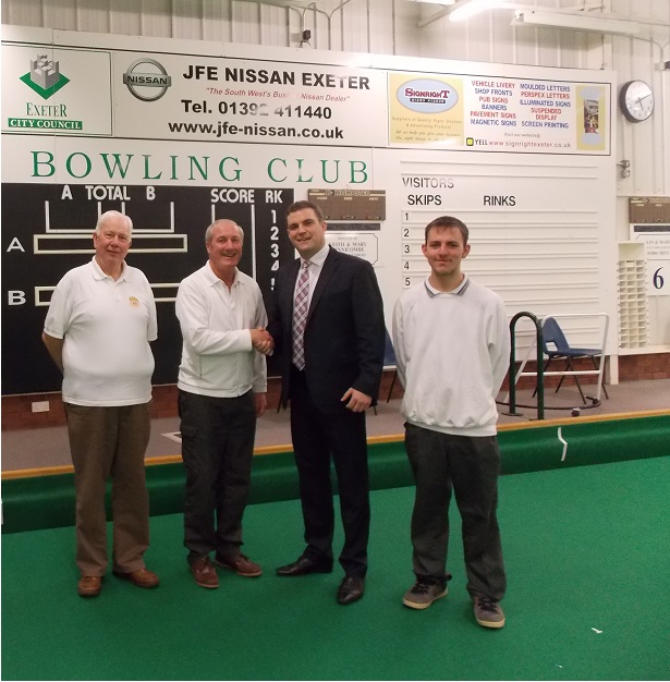 Matthew Holcombe, Dealer Principal at JFE Nissan Exeter, with the winners of the bowling competition