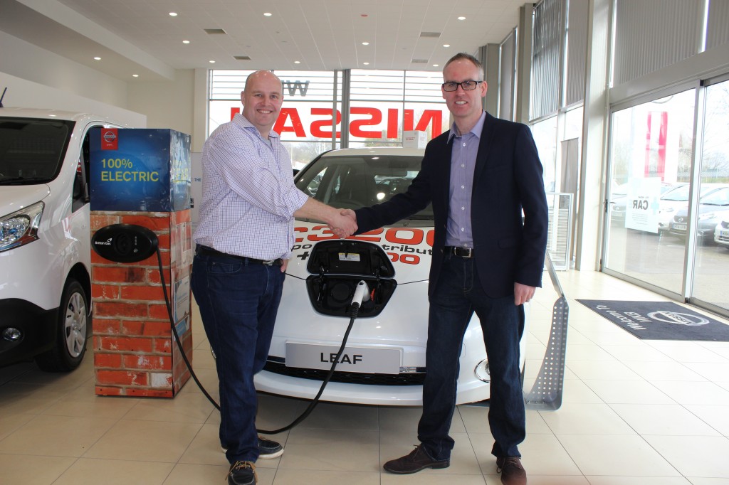 EV enthusiast Grant Thomas, 43, from Emsworth, with Paul O’Neill, Nissan Motor GB Limited EV Manager, at WKB Nissan Waterlooville 
