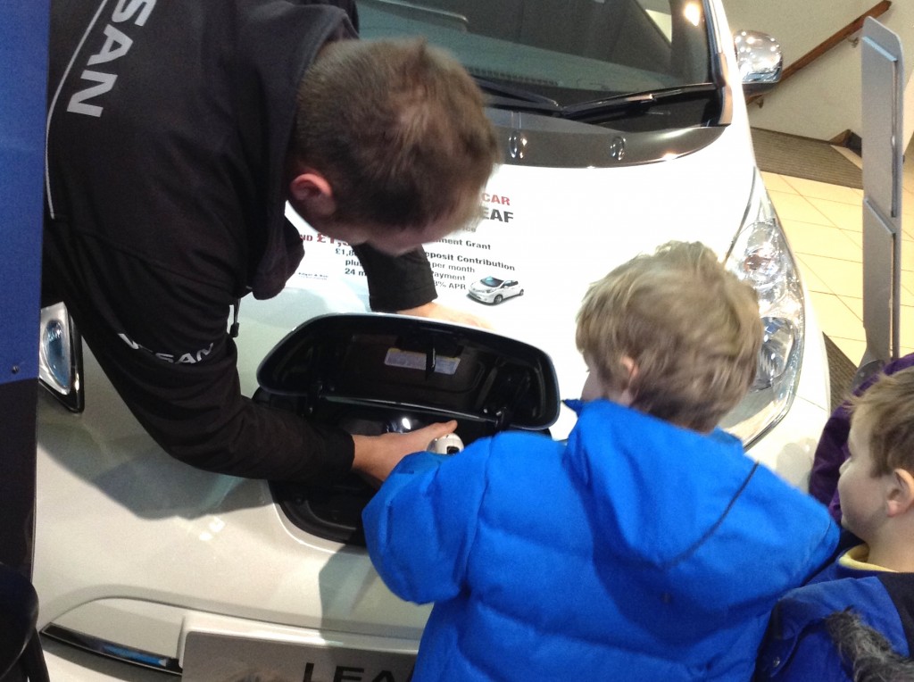 Children from Ennerdale & Kinniside CE Primary School learn how to charge up the Nissan LEAF 