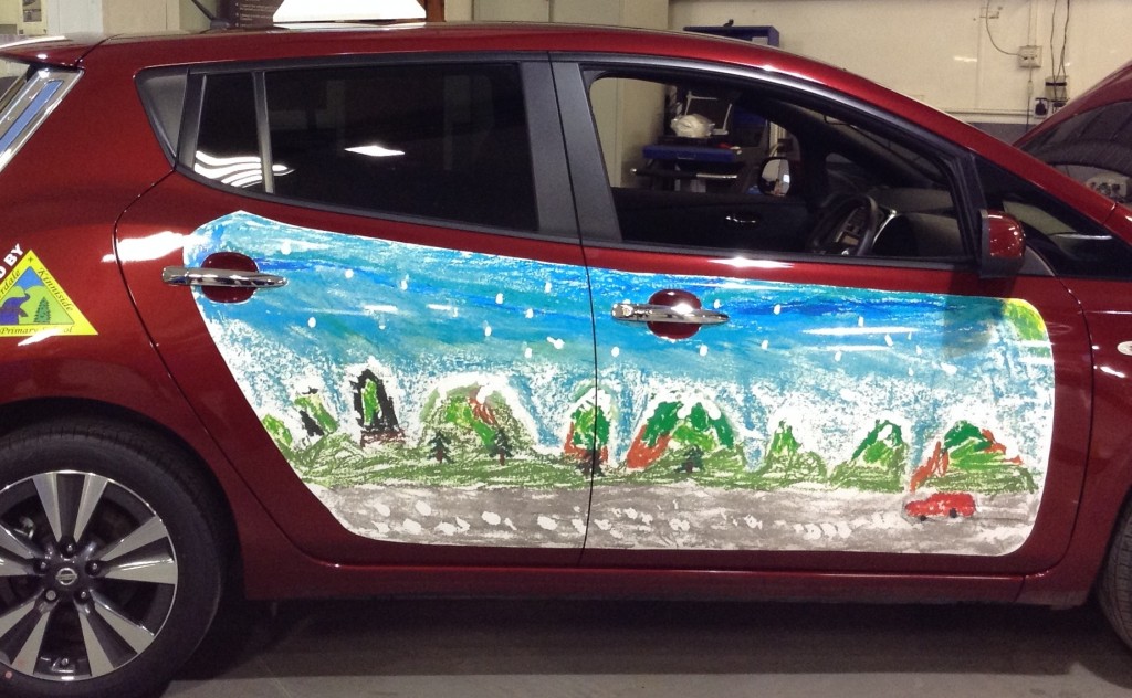 The winning piece of artwork reproduced onto the side of a Nissan LEAF