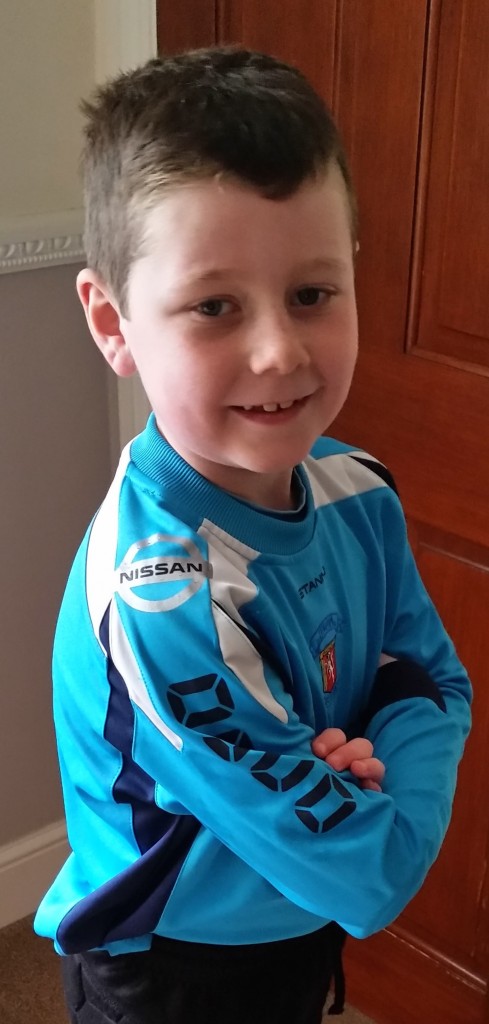 Tyler Thorne, seven, wearing the kit sponsored by Bassetts Nissan Swansea