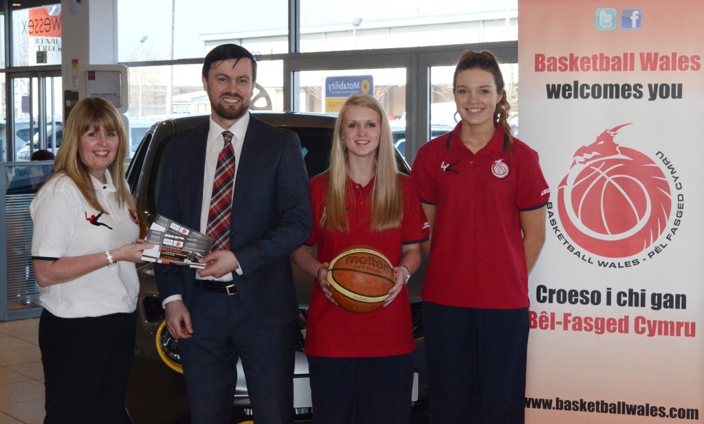 From left: Sarah-Jayne Evans, Welsh Team Manager for the basketball teams, is presented with raffle tickets by Gareth Howells, General Manager at Wessex Garages, with Chloe Richards, U18 captain from Pontycymer, and Carys Allen, U16 captain from Penarth