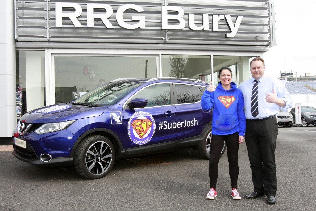 Dawn Fidler, mother of Josh Wilson, gives the thumbs up to the new Nissan Qashqai which was handed over to her by Mike Prince, Dealer Principal at RRG Nissan Bury
