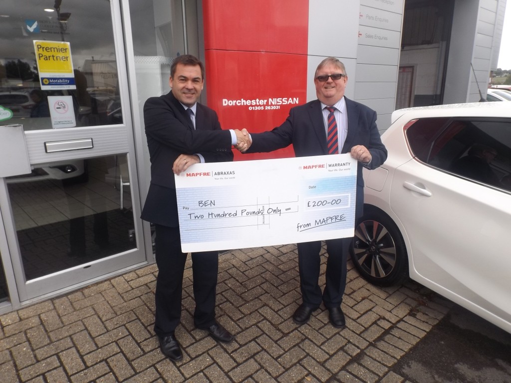 1.Tony Jordan, Dealer Principal at Dorchester Nissan, with Chris Adolph Business Development Manager of MAPFRE, with the £200 for motoring charity, BEN