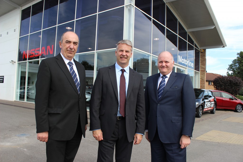 Dave Murfitt, Director of Network Development and Quality at Nissan Motor (GB) Limited, middle, with Tony Jones, Brand Director of Motorline Nissan, left, and Gary Obee, Managing Director of Motorline Nissan, right, at the new Motorline Nissan Reading dealership