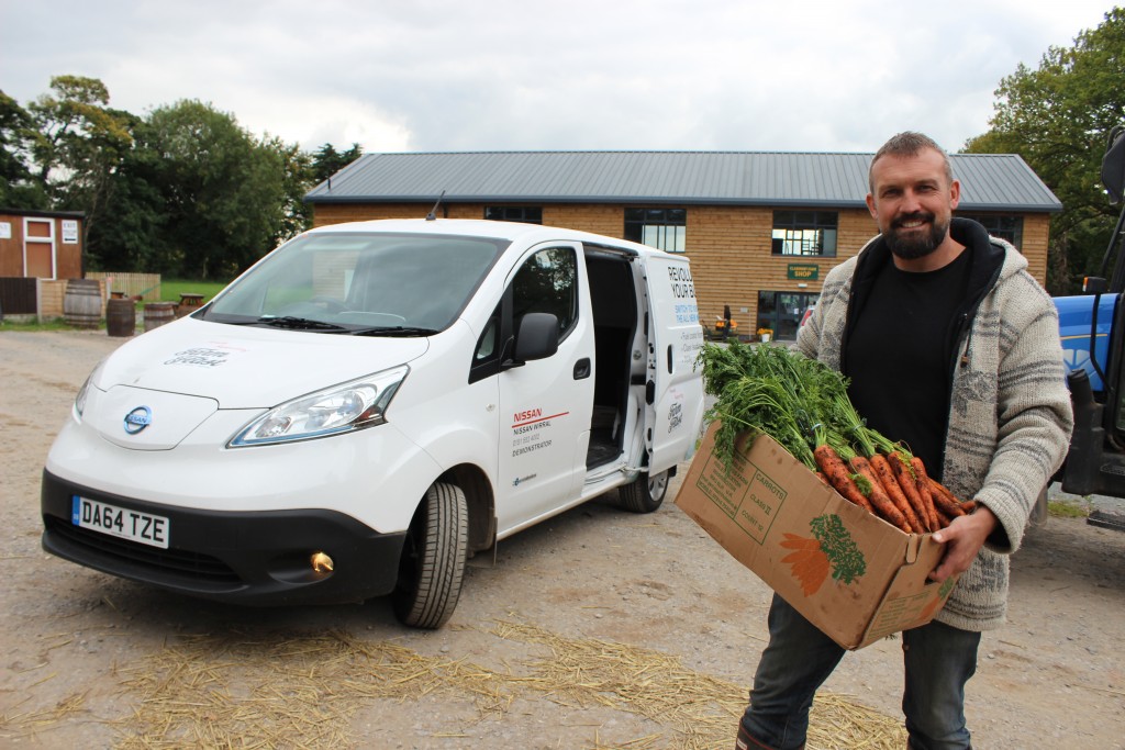 Managing Director of Claremont Farm, Andrew Pimbley, with the e-NV200