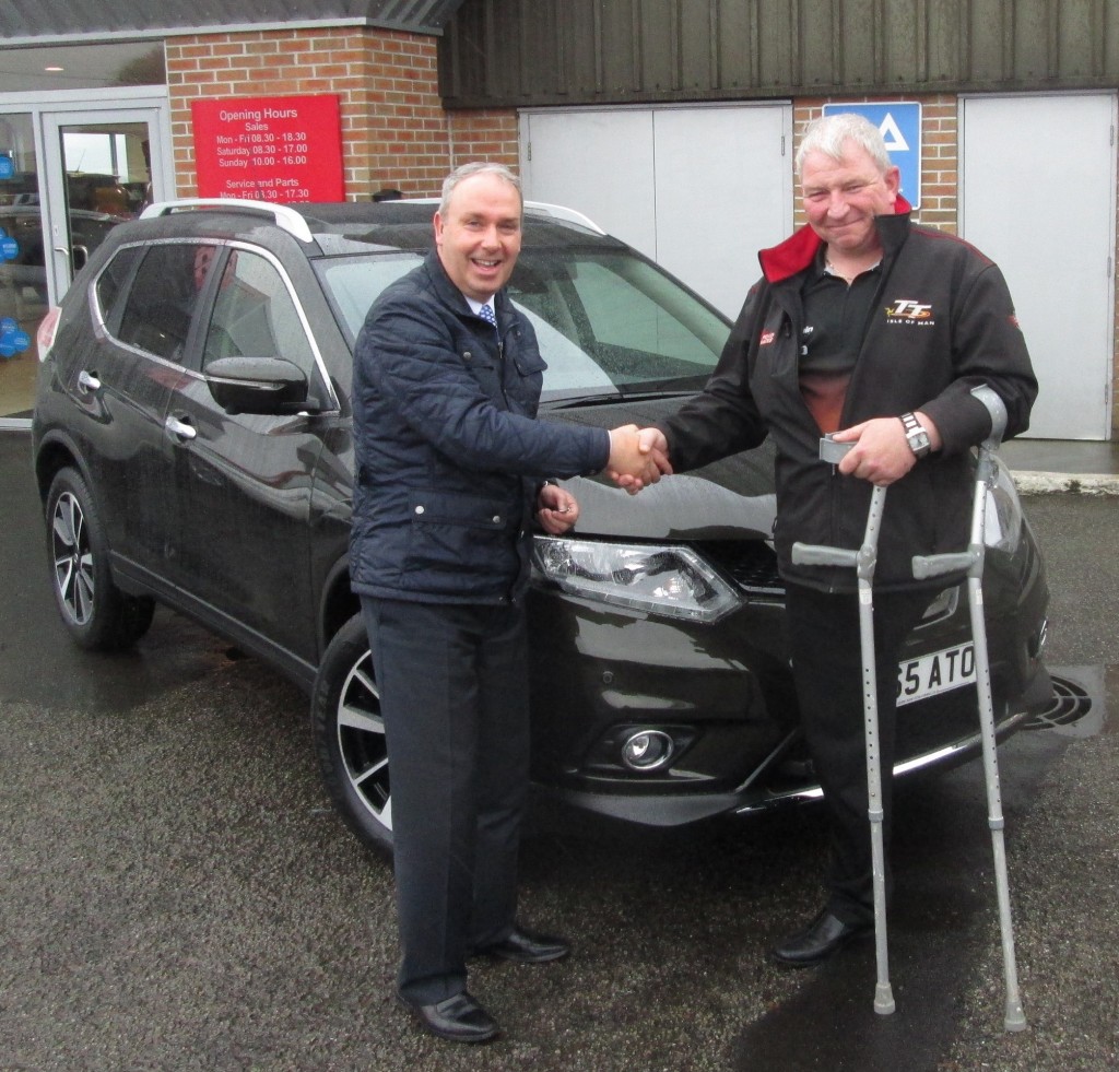 Mick Wheeler, Sales Executive at Town and Country Nissan, with  World Wheelchair Darts champion Ricky Chilton
