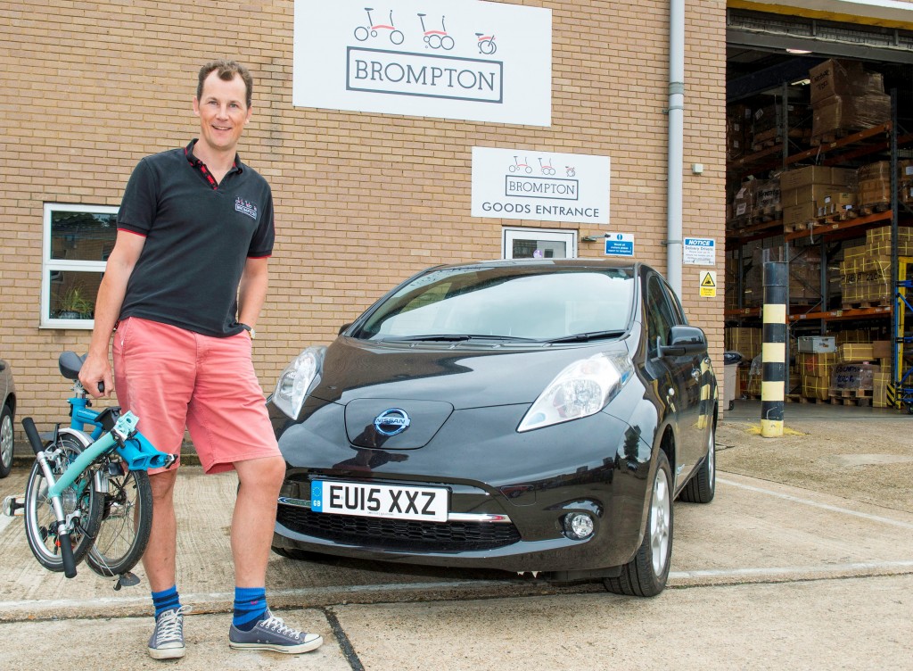 Brompton’s Chief Executive Officer, Will Butler-Adams OBE, with one of the company’s world-renowned folding bikes and the Nissan LEAF.