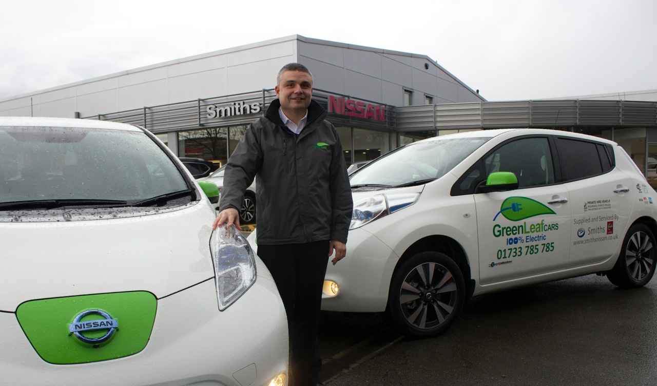 Too Howard, owner of Green Leaf Cars, pictured outside Smiths Nissan in Peterborough.
