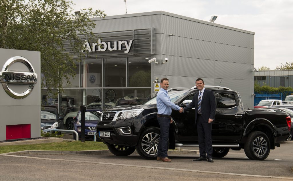 Will Palin collects his new Nissan NP300 Navara from Neil Timmins, Dealer Principal at Arbury Nissan in Leamington Spa. Picture by Mitchell Leek.