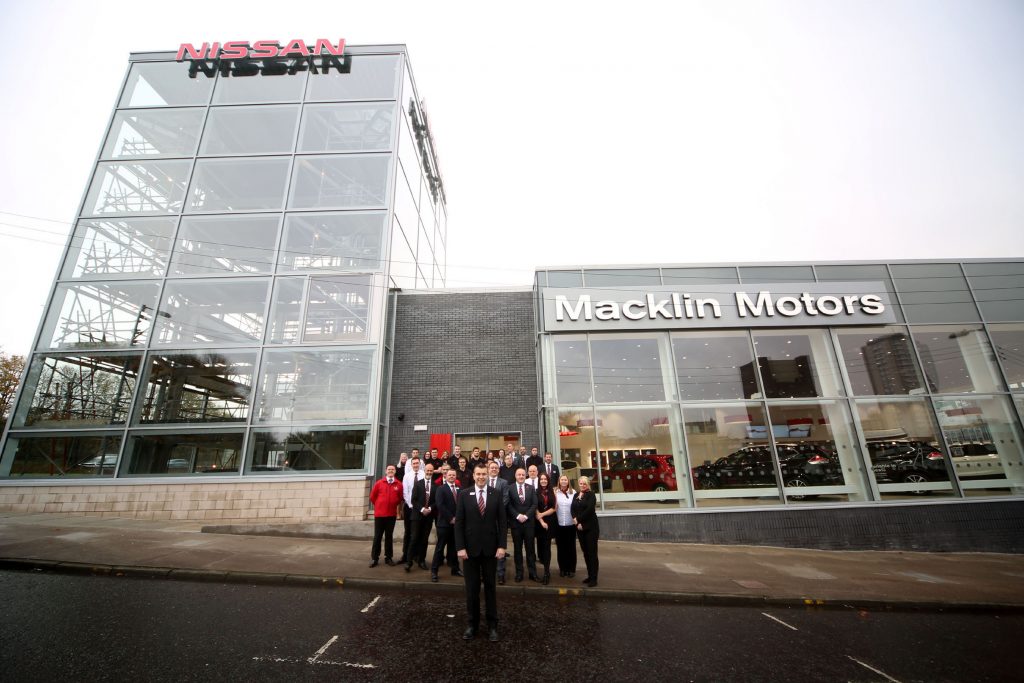 Robert Auld and his team outside the new Macklin Motors Nissan Glasgow dealership.
