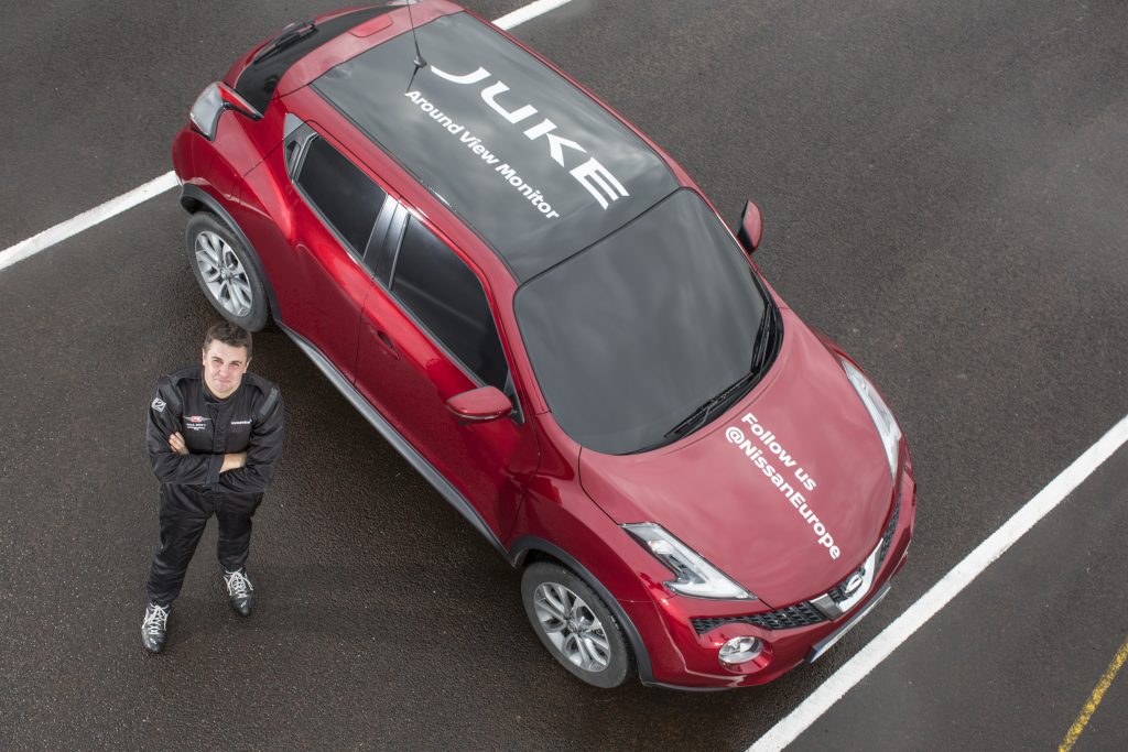 Stuntman Paul Swift with the Nissan Juke he drove to set the world's first 'blind' J-turn record.