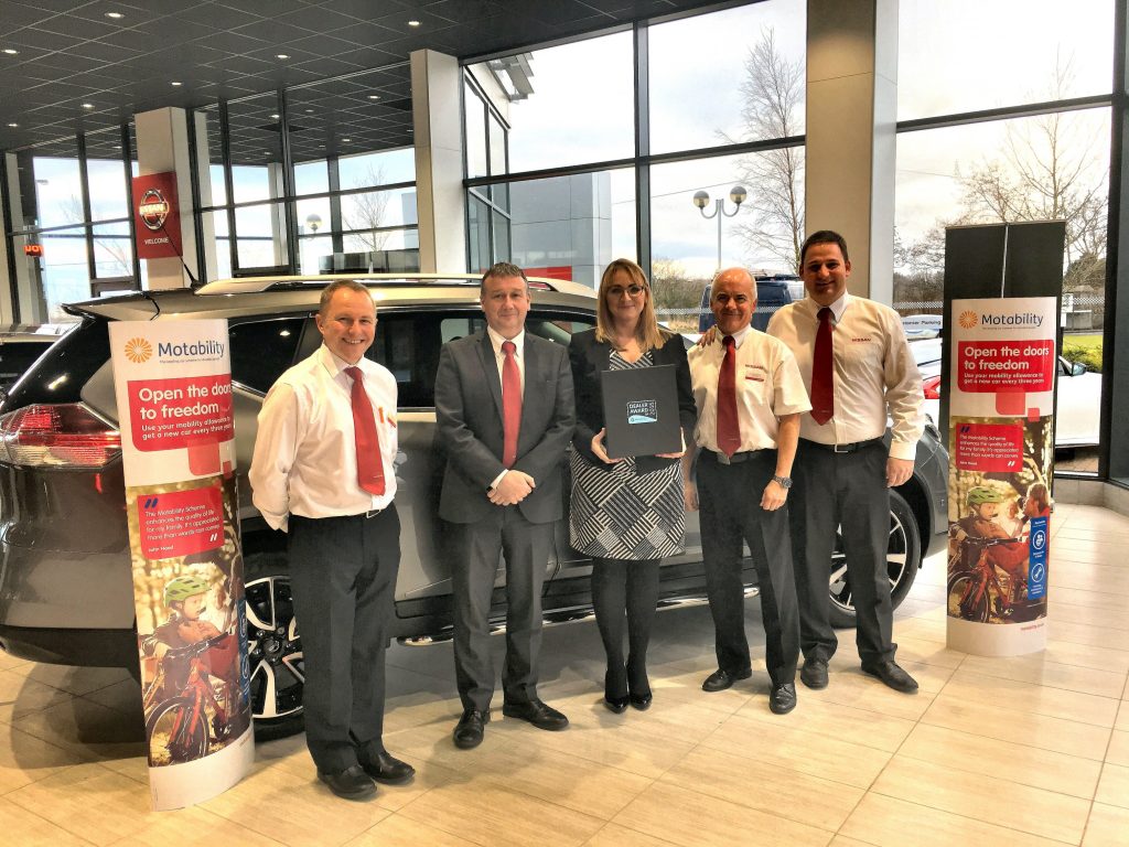 From left, EV Specialist Jim Rowan, Service Manager Andrew Macfarlane, Motability Operations Dealer Development Manager Linsey Mackie, Sales Manager Gordan Campbell and Sales Executive John Allan.