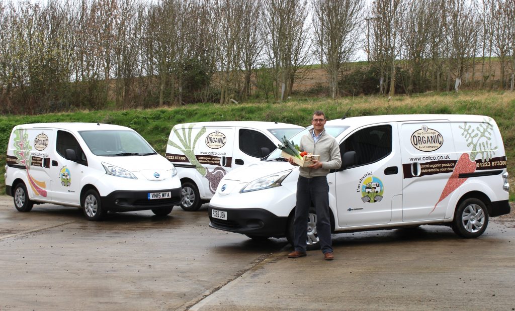 Duncan Catchpole with The Cambridge Organic Food Co's three e-NV200s.