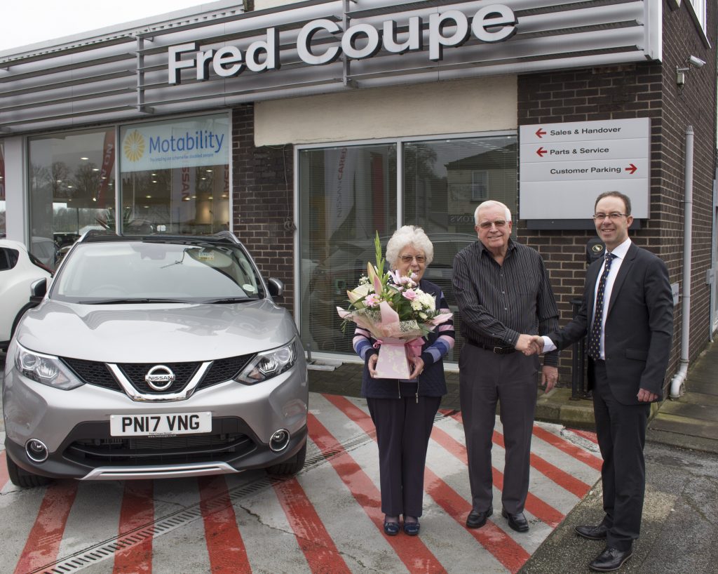 Tony and Anne Adkinson with John Coupe, Director of Fred Coupe Nissan.