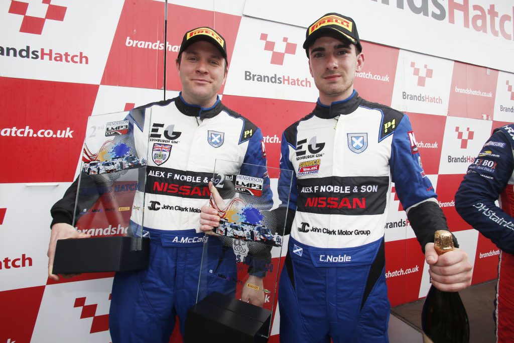 Colin Noble (right) and Alasdair McCaig on the winners podium at Brands Hatch.