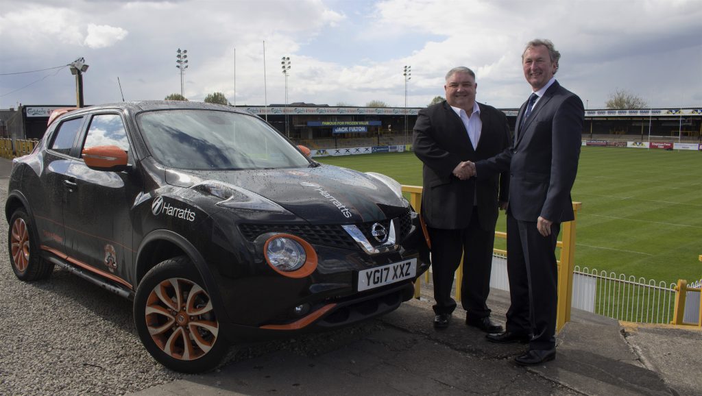 Chris Powell, from Castleford Tigers, with Shaun Harratt, Harratts Group Managing Director.