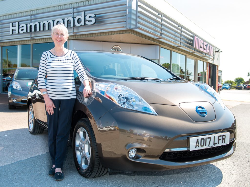 Diane Ray with her new Nissan LEAF, the 20,000th LEAF to be sold in the UK.