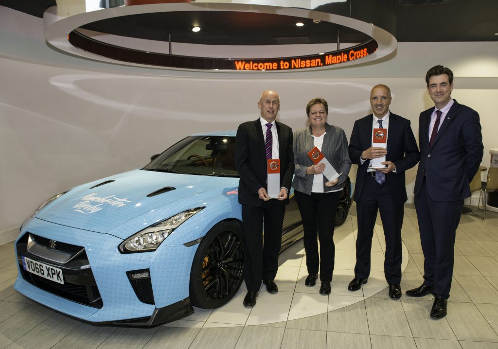 From left, the winners Kevin Abbs, of Crayford & Abbs, Pauline Turner, of Chorley Group, Mike Finn, of Wellington Motors, and Nissan Motor GB Managing Director Alex Smith.