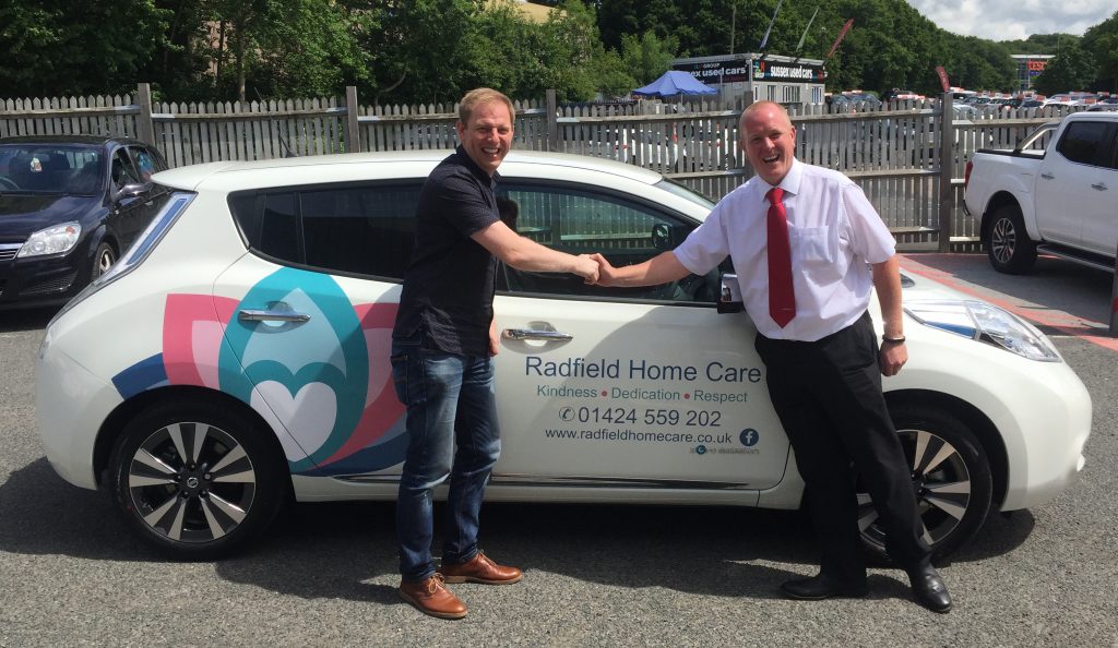 Left, Samuel Holmes, Director of Radfield Home Care Hastings & Rother, and Jon Nash, from SLM Nissan.