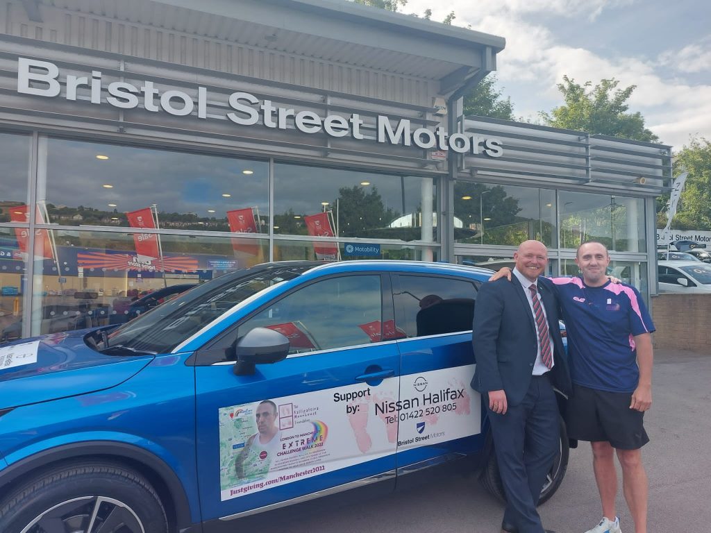 Jamie Priestley, General Manager at Bristol Street Motors Halifax Nissan with Ben Moorhouse